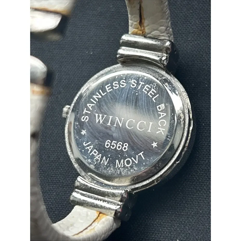 Wincci Silver Tone White Dial And Band Women’s Cuff Watch